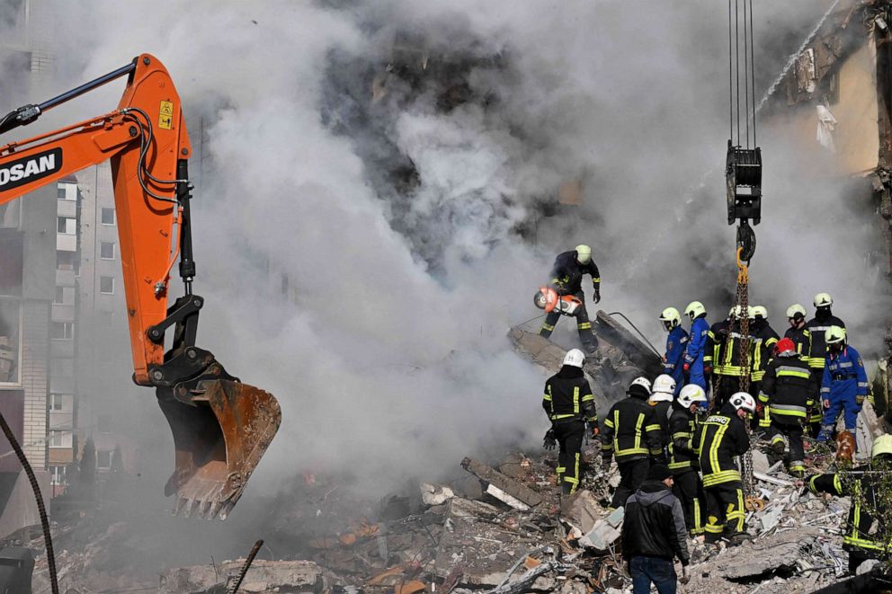 PHOTO: Rescuers search for survivors in the rubble of a residential building that was struck by Russian missiles in Uman, Cherkasy Oblast, central Ukraine, on April 28, 2023.