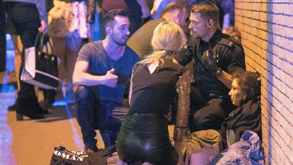 People gather near the Manchester Arena after reports of an explosion on May 22, 2017 in Manchester, England.