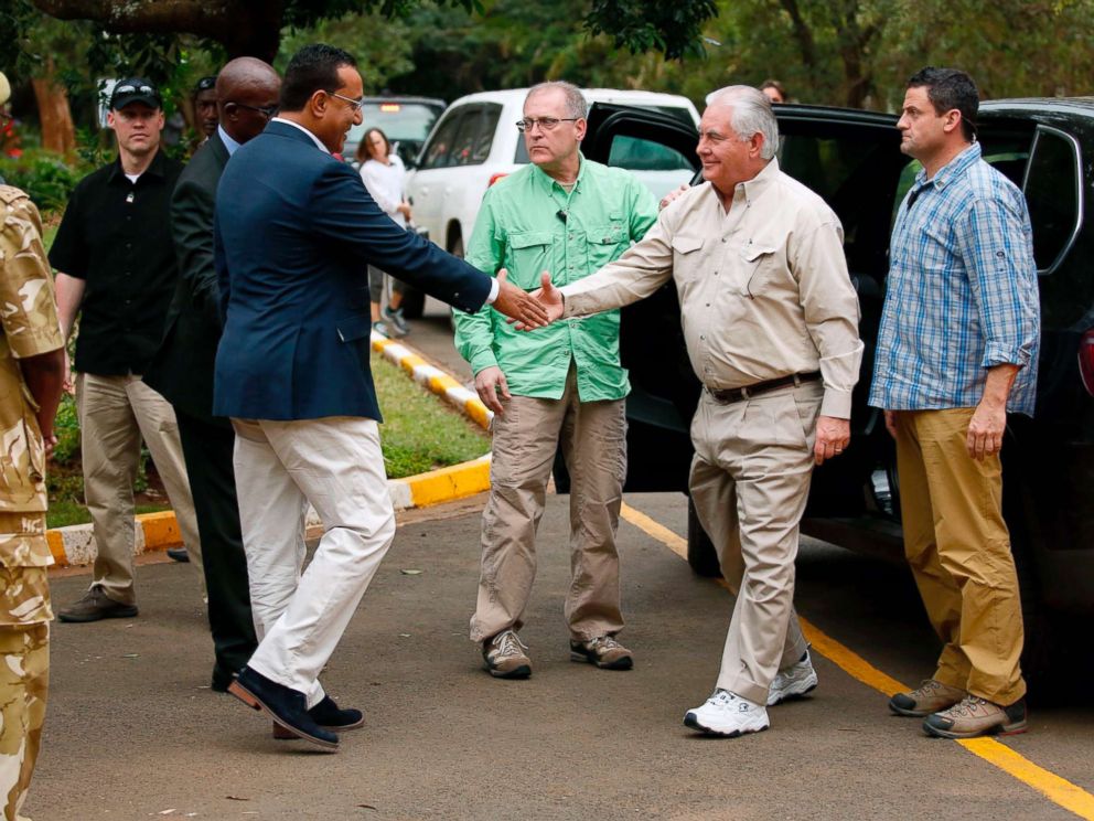 PHOTO: Kenyas Cabinet Secretary for Tourism Najib Balala (2-L) shakes hands with US Secretary of State Rex Tillerson (2-R) prior to a tour of the Kenya Wildlife Service in Nairobi, on March 11, 2018.