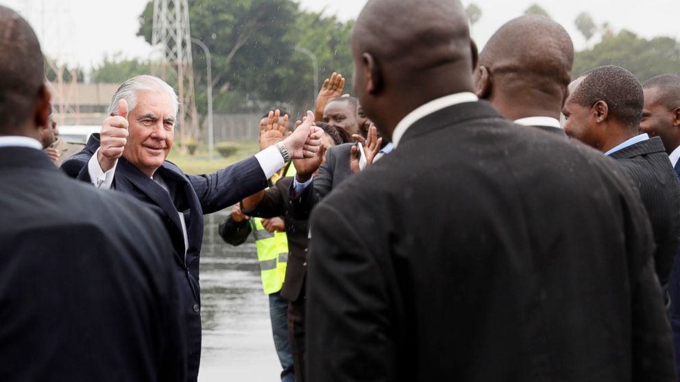 U.S. Secretary of State Rex Tillerson bids farewell to support staff as he boards his plane to depart Jomo Kenyatta International Airport in Nairobi, March 12, 2018.