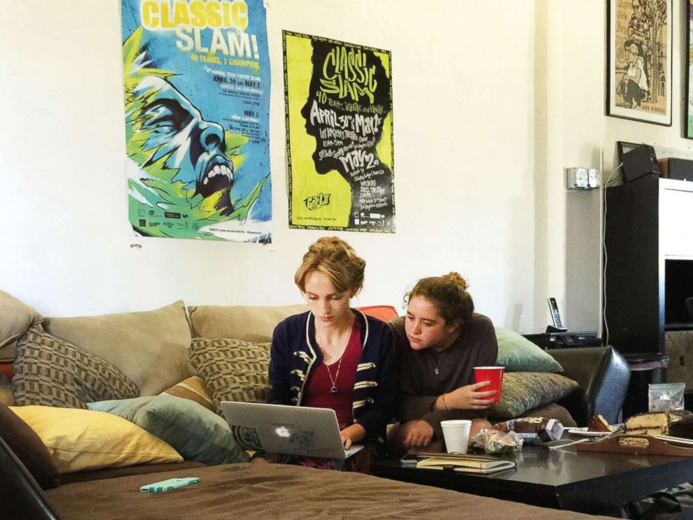 PHOTO: Rhiannon McGavin 17, and Miriam Sachs, members of Get Lit, polish a word poem during a Saturday working session. The time Get Lit poets were finalists in a competition, they third in the world.