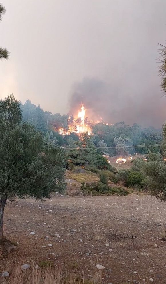 Wildfires rage amid heat wave in Greece, prompting evacuations and call