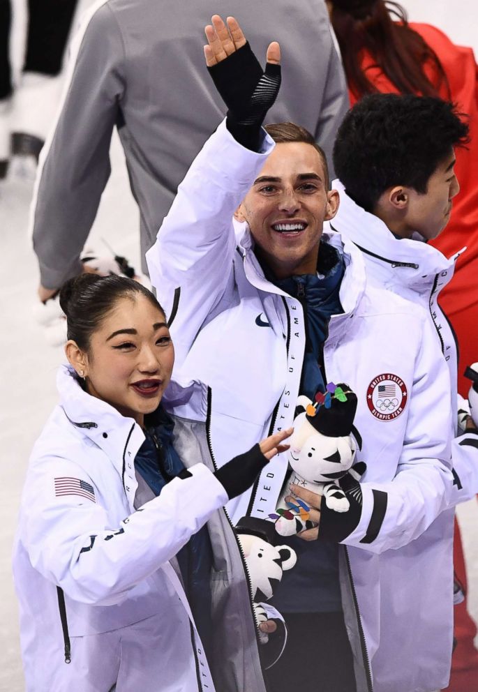 PHOTO: USA's Mirai Nagasu (L) and USA's Adam Rippon celebrate during the venue ceremony after winning bronze in the figure skating team event during the Pyeongchang 2018 Winter Olympic Games at the Gangneung Ice Arena in Gangneung, Feb. 12, 2018.