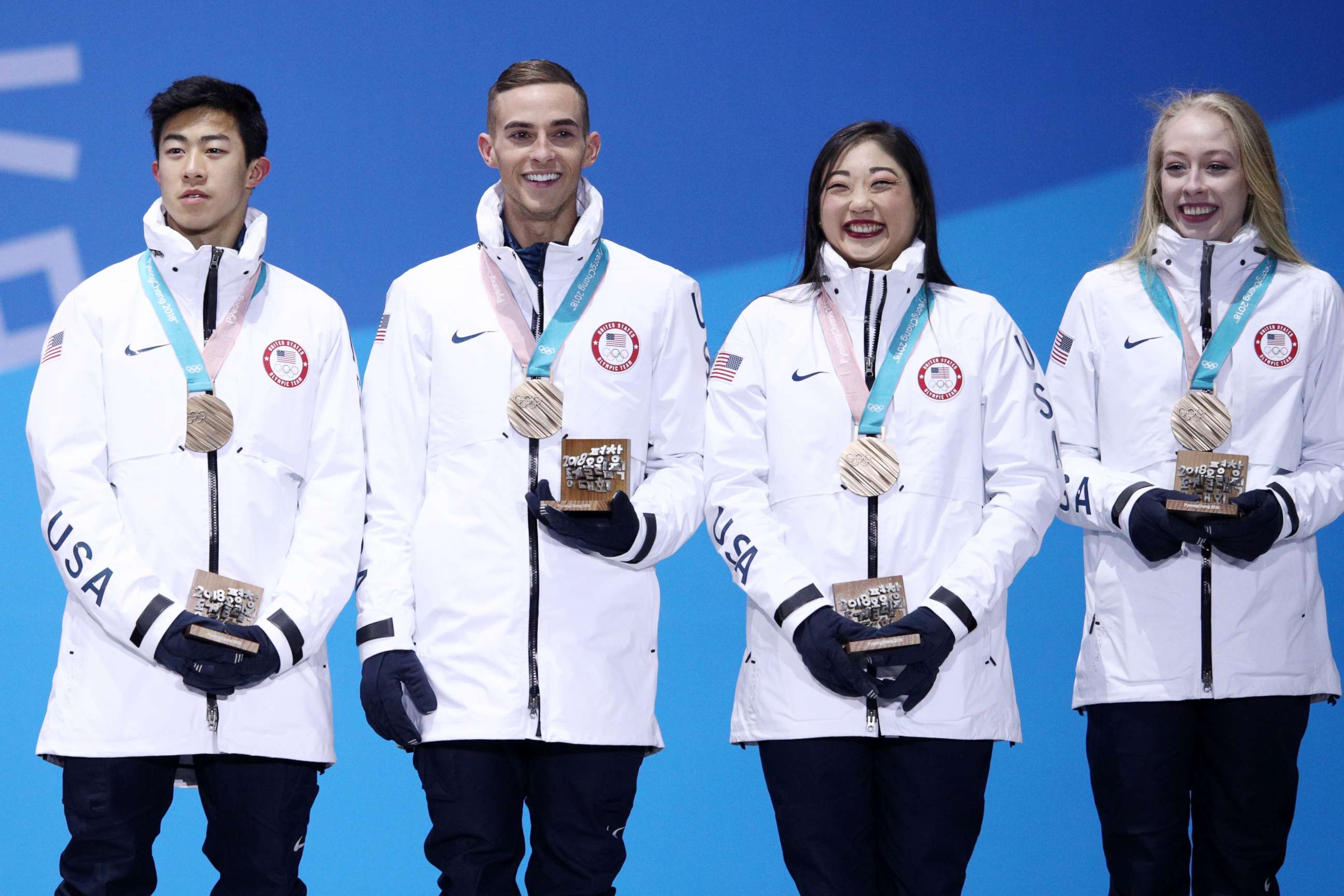 PHOTO: (L-R) Bronze medalists Nathan Chen, Adam Rippon, Mirai Nagasu and Bradie Tennell of team U.S. celebrate during the medal ceremony after the figure skating team event at Medal Plaza, Feb. 12, 2018, in Pyeongchang, South Korea.