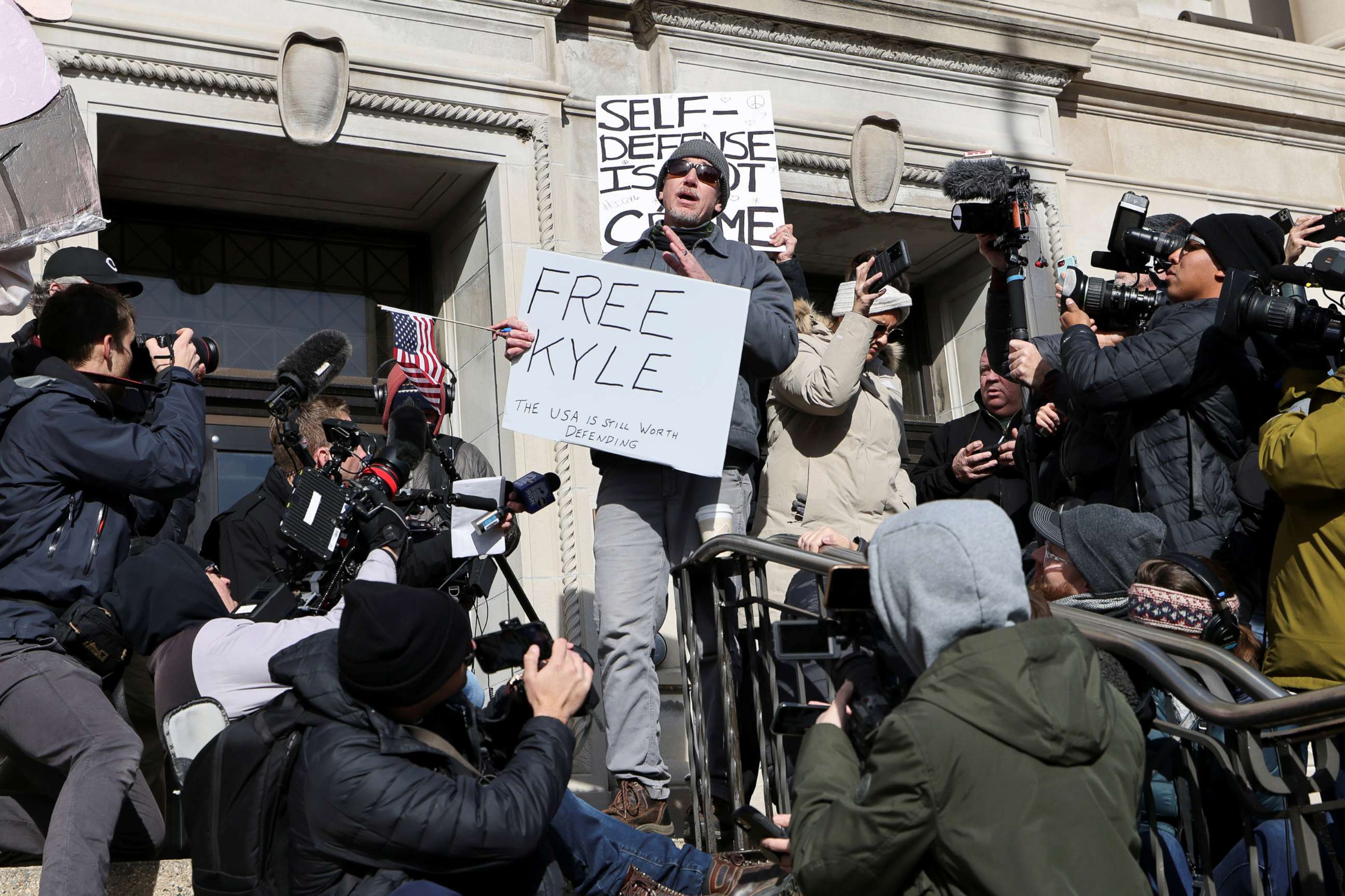 PHOTO: People react to the verdict in the trial of Kyle Rittenhouse, outside the Kenosha County Courthouse in Kenosha, Wisconsin, Nov. 19, 2021.