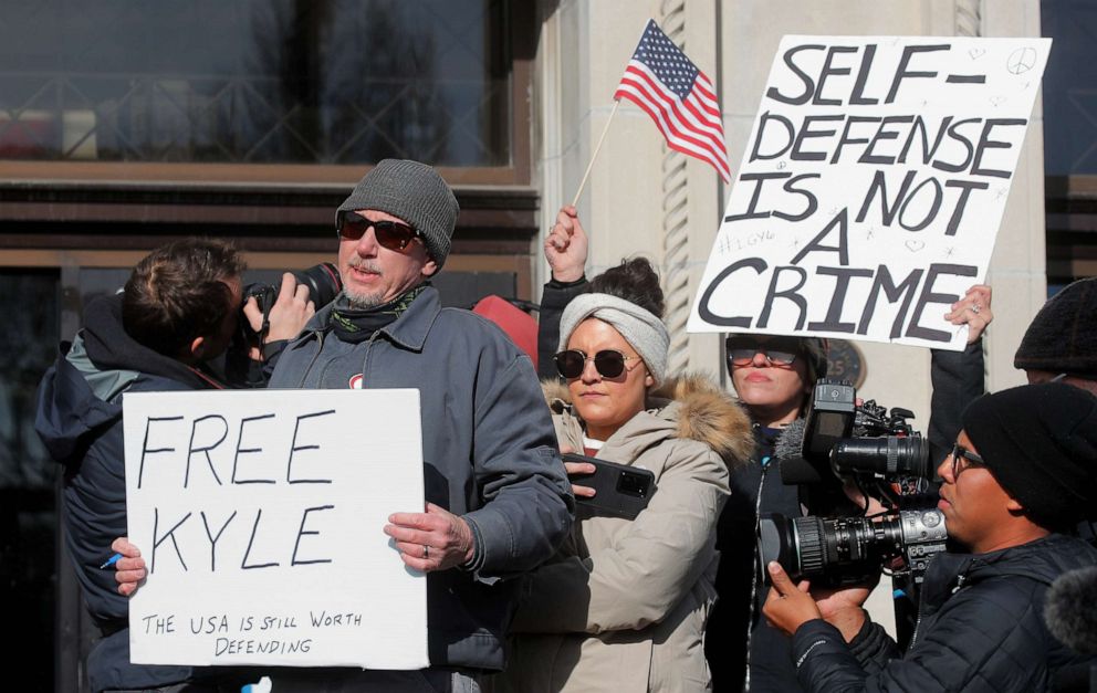 PHOTO: People await the verdict in the trial of Kyle Rittenhouse, outside the Kenosha County Courthouse in Kenosha, Wisconsin, Nov. 19, 2021.