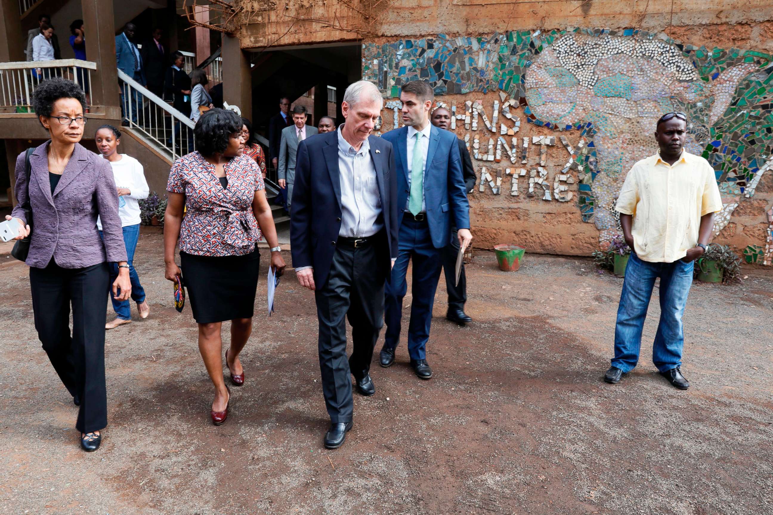 PHOTO: U.S. Ambassador to Kenya Robert Godec (C) visits a President's Emergency Plan for AIDS Relief (PEPFAR) project for girls' empowerment in Nairobi, March 10, 2018. 
