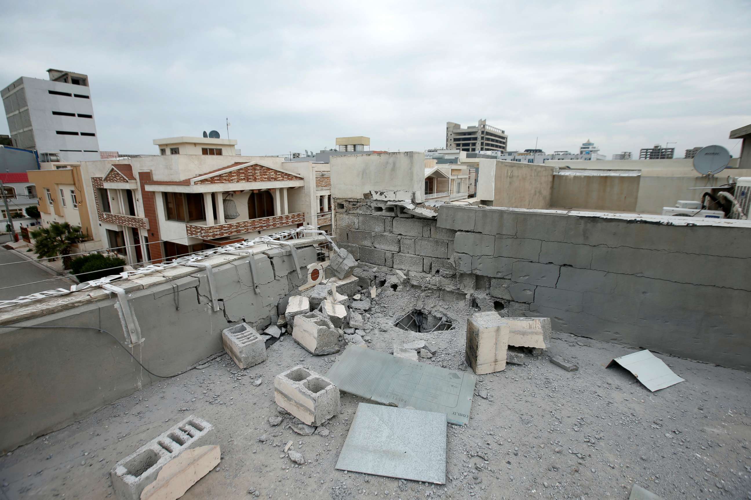 PHOTO: A roof is seen damaged in the city of Erbil after a barrage of rockets hit areas in and around Erbil International Airport in Iraq's semi-autonomous Kurdish region on Feb. 16, 2021.