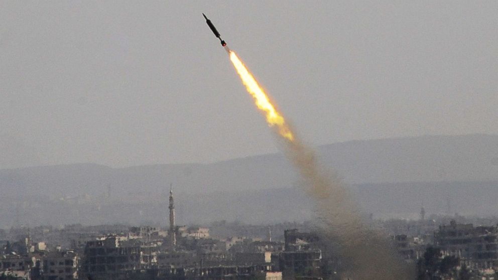 PHOTO: A rocket is seen launched by the Syrian army in Eastern Ghouta countryside of Damascus, Syria, on April 7, 2018.