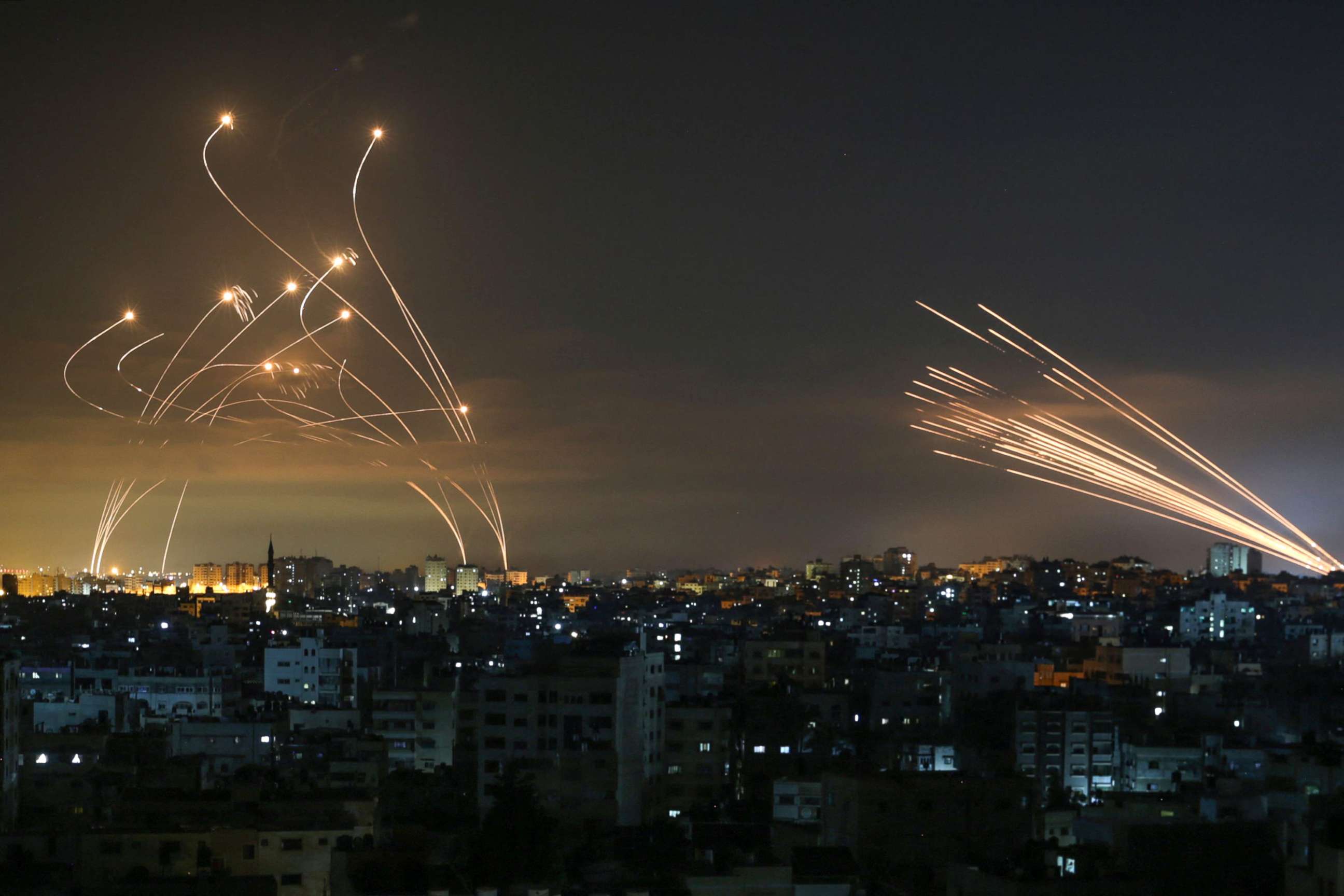 PHOTO: Rockets fired towards Israel from Beit Lahia in the northern Gaza Strip, light up the night sky, May 14, 2021.
