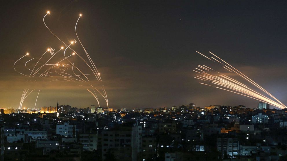 PHOTO: Rockets fired towards Israel from Beit Lahia in the northern Gaza Strip, light up the night sky, May 14, 2021.