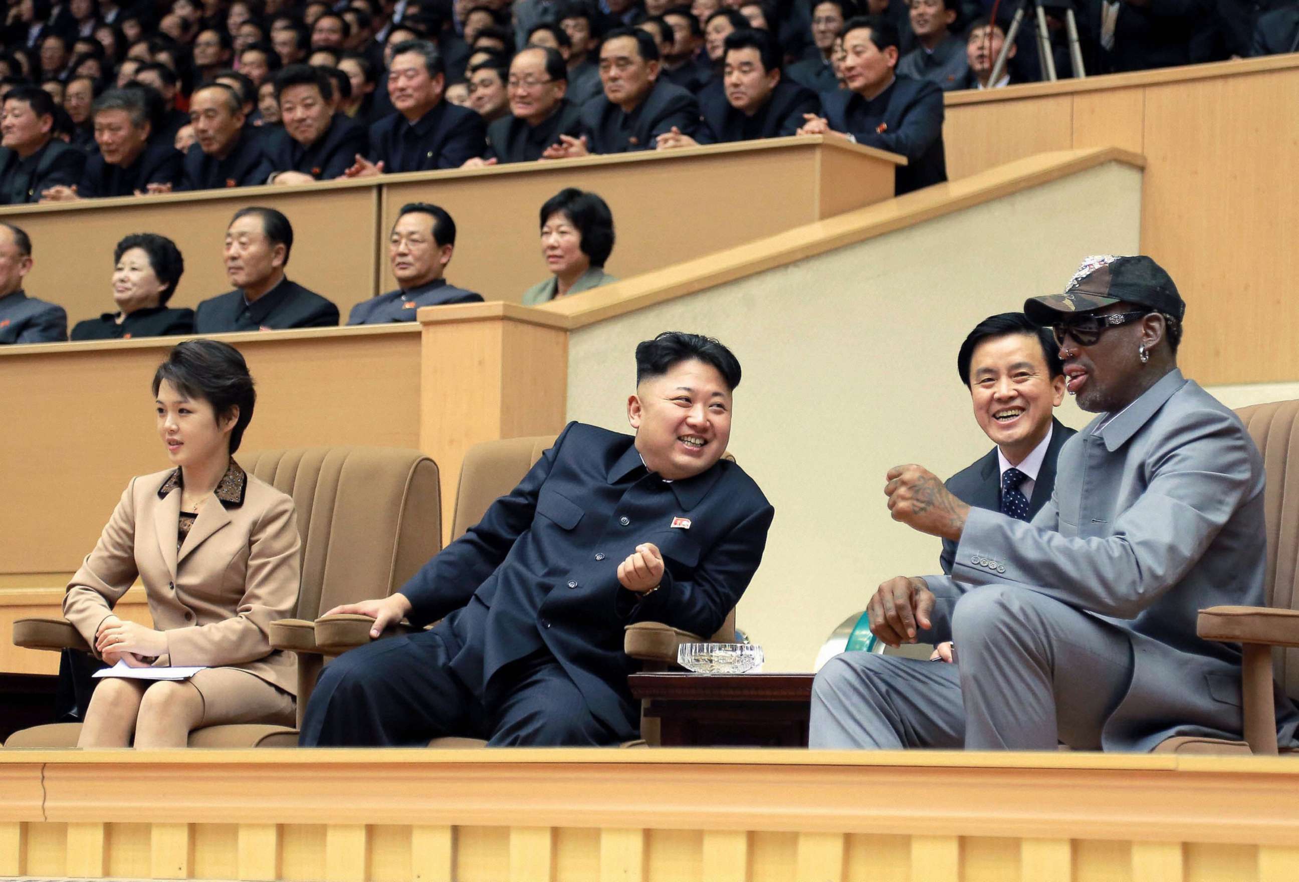 PHOTO: Former basketball star Dennis Rodman, right, and North Korean leader Kim Jong Un, 2nd from left, watch a basketball game between American and North Korean players at the Pyongyang Indoor Stadium on Jan. 8, 2014.