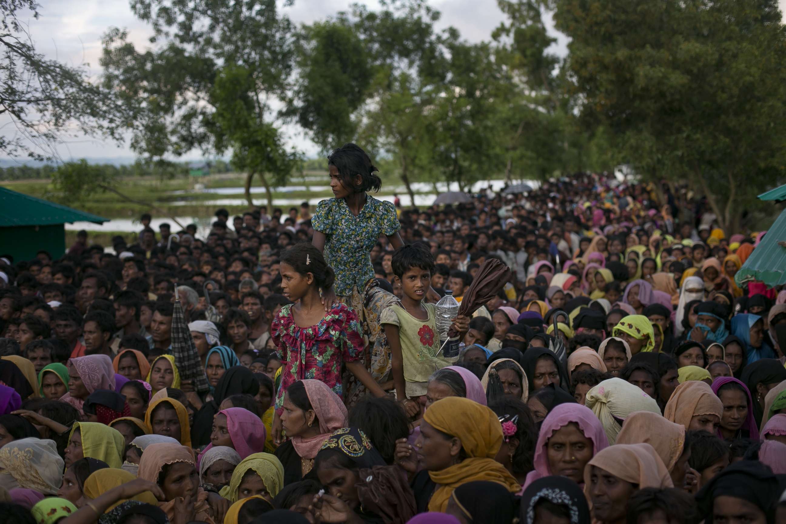 PHOTO: Rohingya refugees wait to receive aid donations, Sept. 13, 2017, in Cox's Bazar, Bangladesh. 