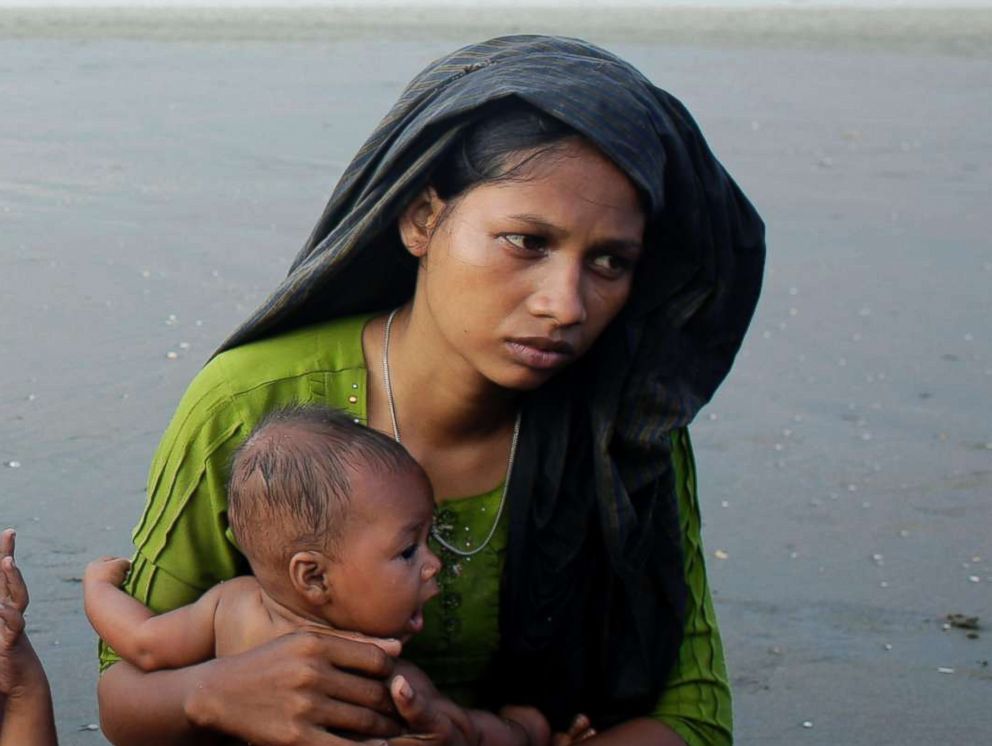 PHOTO: Rohingya Refugees take rest on the shore of Naf river after they arrived by boats, in Teknaf, Bangladesh, Sept. 13, 2017.