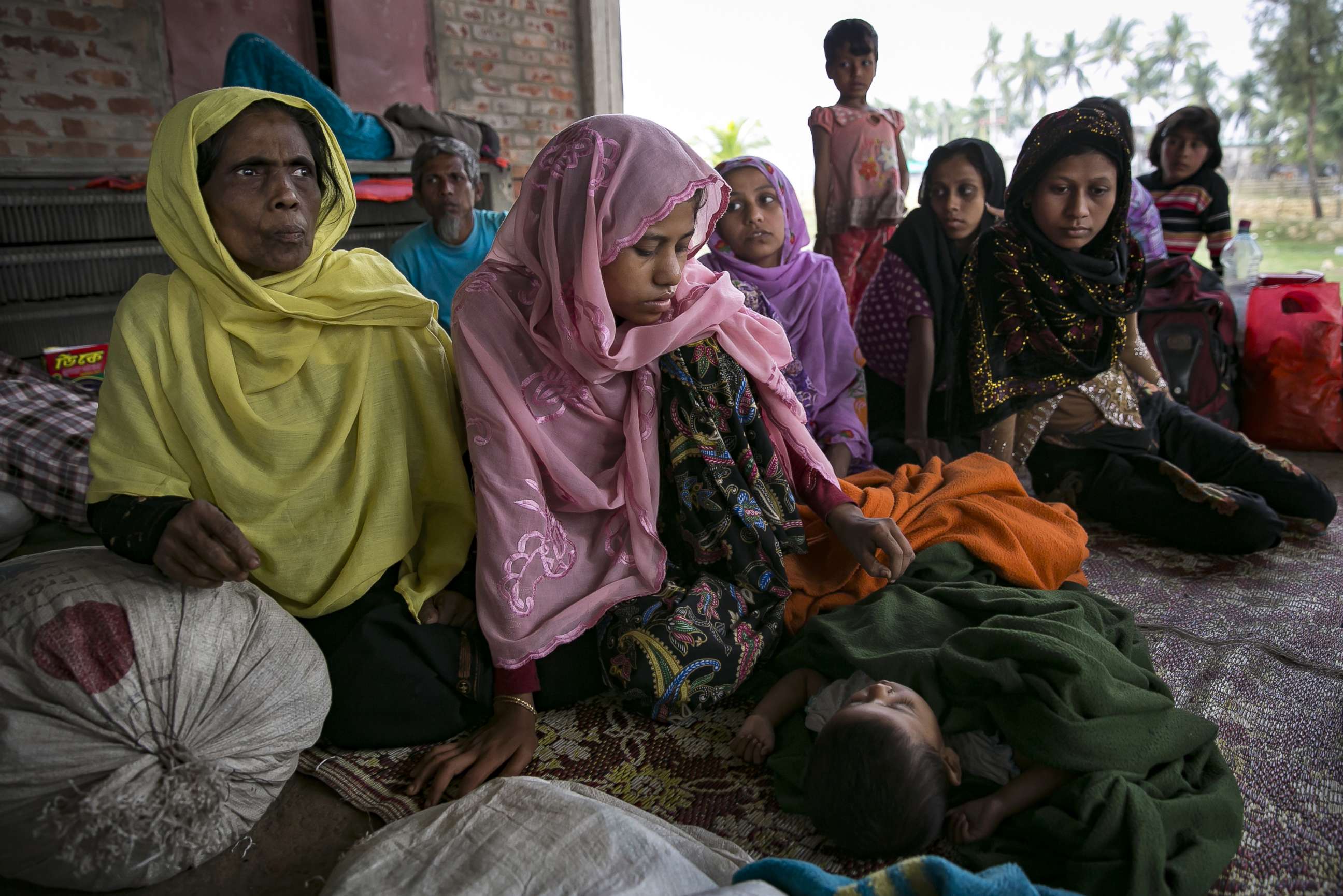 PHOTO: Recently arrived Rohingya refugees rest after crossing into Bangladesh, Nov. 24, 2017 in Cox's Bazar, Bangladesh.