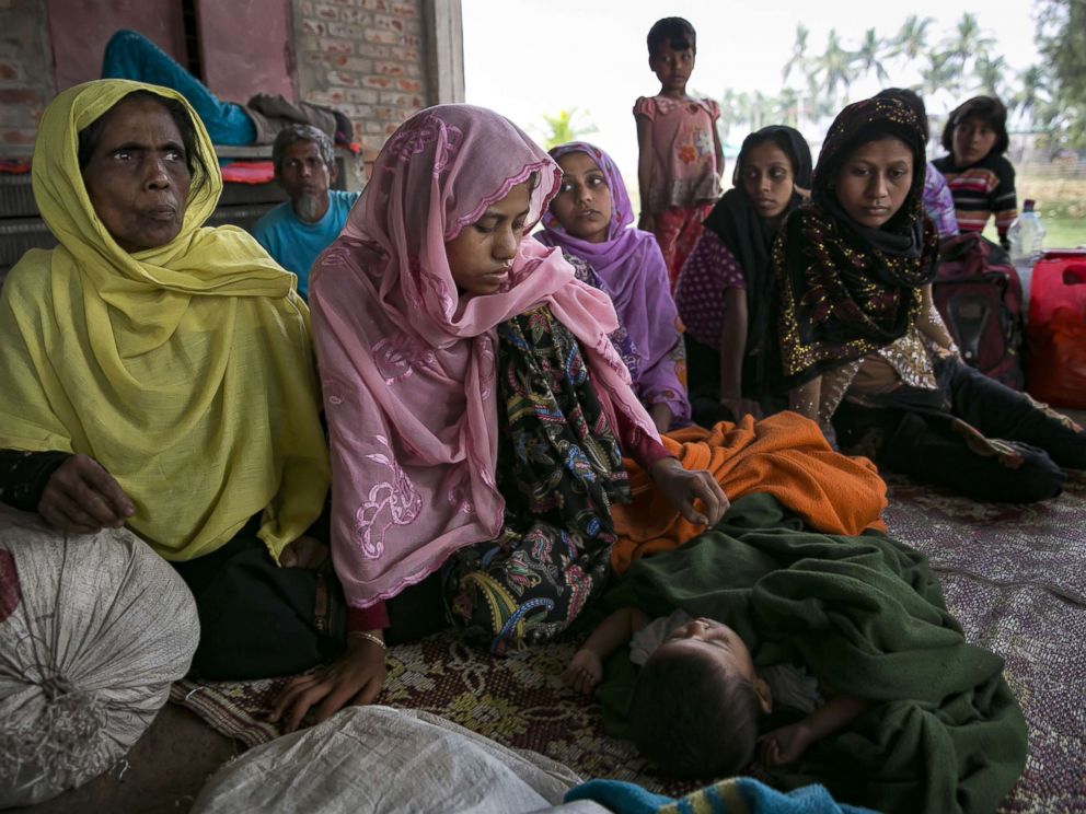 PHOTO: Recently arrived Rohingya refugees rest after crossing into Bangladesh, Nov. 24, 2017 in Coxs Bazar, Bangladesh.