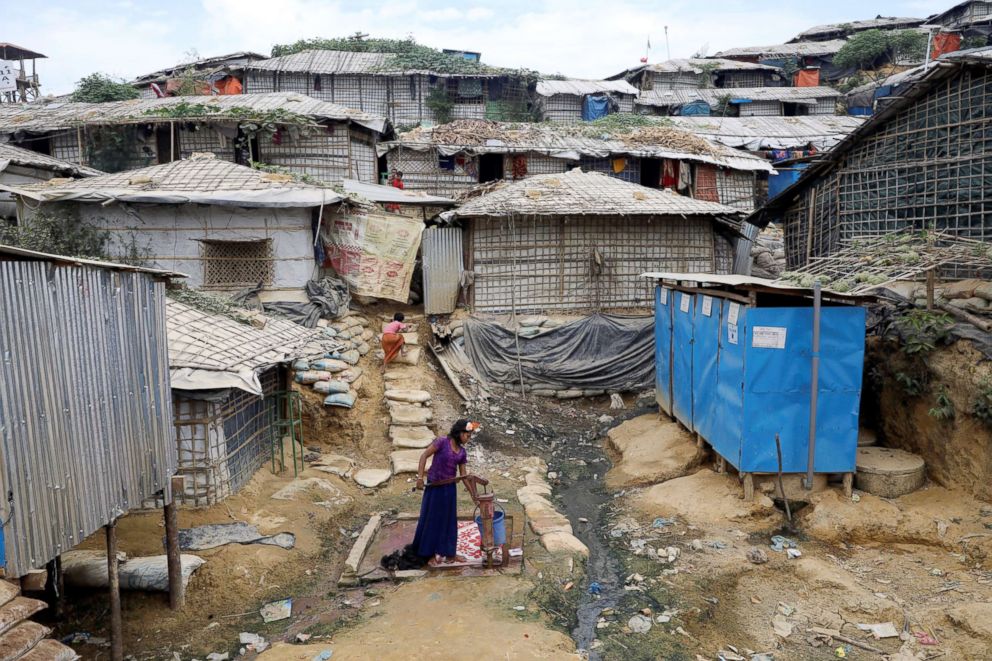 PHOTO: A Rohingya refugee girl collects water from a tube-well at the Balikhali camp in Cox's Bazar, Bangladesh, Nov. 14, 2018.