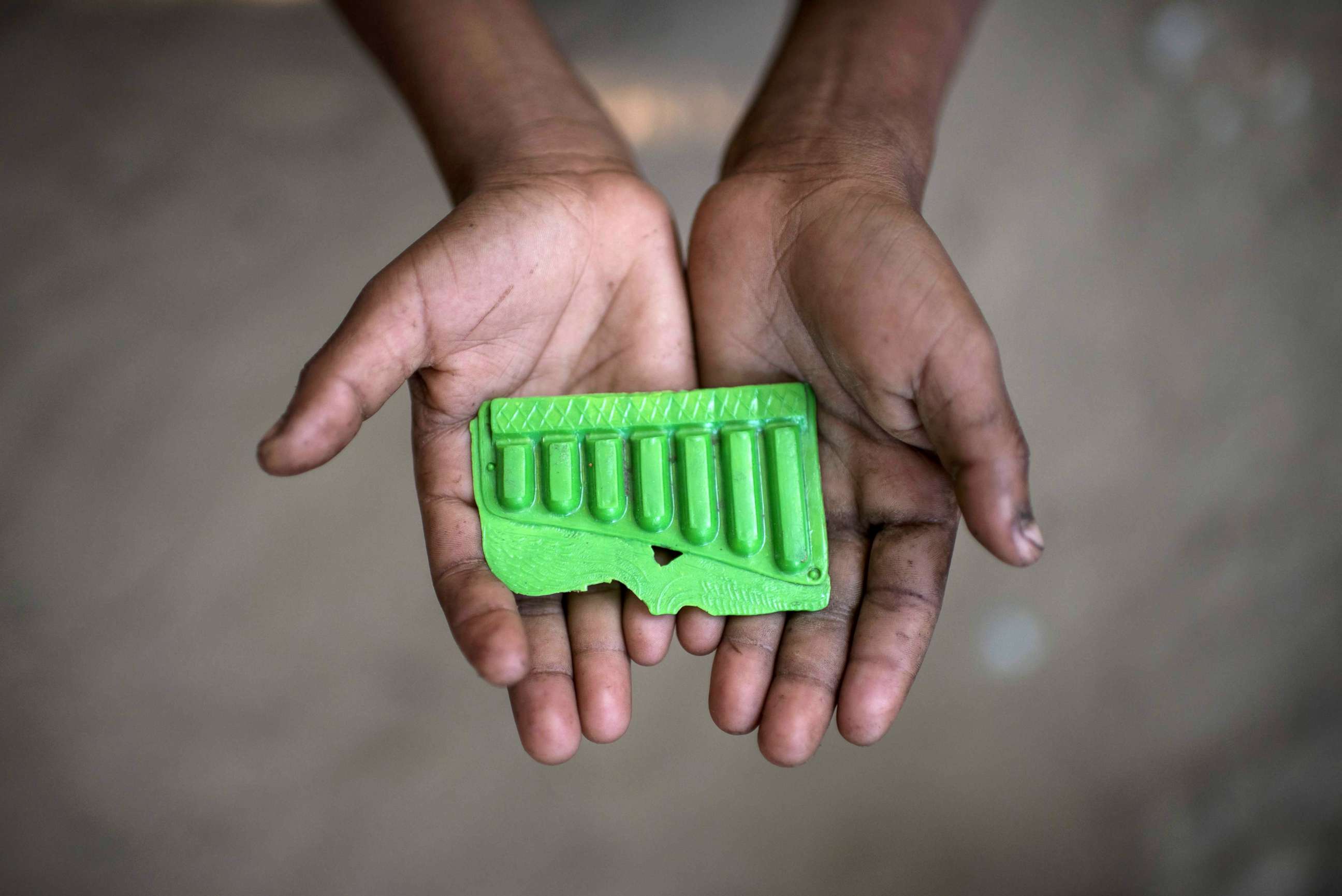 PHOTO: Rohingya migrant boy Mohammad Rafiq (8), who fled Myanmar in October, holds a toy whistle at the Shamlapur refugee camp in Cox's Bazar, Dec. 1, 2017.