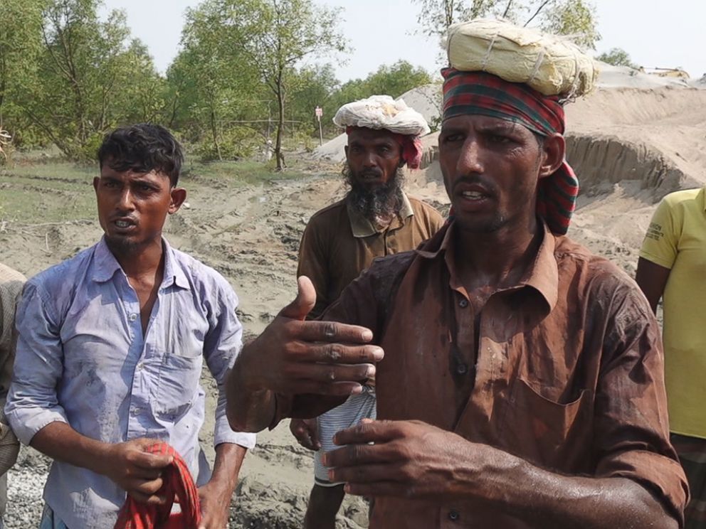 PHOTO: Workers describe the housing the Bangladesh government is building for thousands of Rohingya refugees.