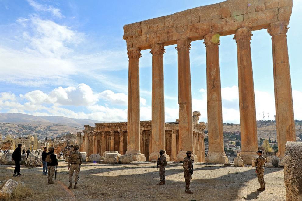 PHOTO: Lebanese army soldiers stand guard in front of the six columns of the Temple of Jupiter at the Roman citadel of Baalbeck, during a visit by the U.N. special coordinator for Lebanon and the director of UNESCO's Beirut office on Nov. 21, 2024.