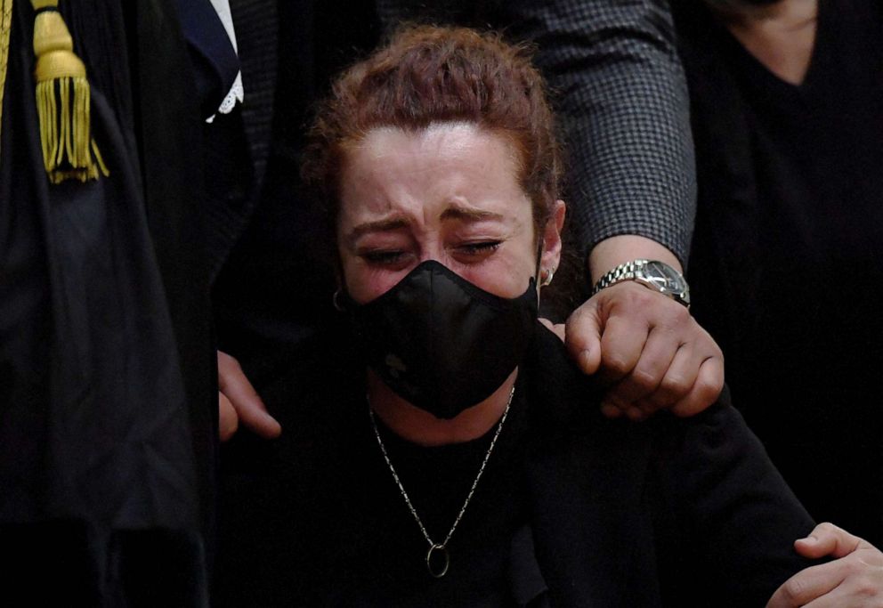 PHOTO: Rosa Maria Esilio bursts into tears in a courtroom in Rome, Italy, on May 5, 2021, after a jury convicted two Americans on murder charges for the 2019 killing of Esilio's husband, an Italian police officer.