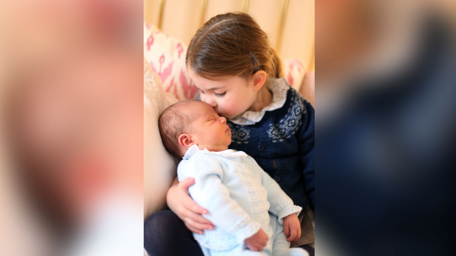 PHOTO: A photo made available by Kensington Palace on May 5,2018 and taken by Catherine, Duchess of Cambridge shows her daughter Princess Charlotte kissing her brother Prince Louis on her third birthday in London, May 2, 2018.