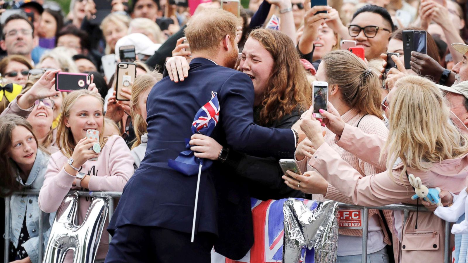 PHOTO: Britain's Prince Harry hugs a member of the public as he arrives at the Royal Botanic Gardens in Melbourne, Australia, Oct. 18, 2018.