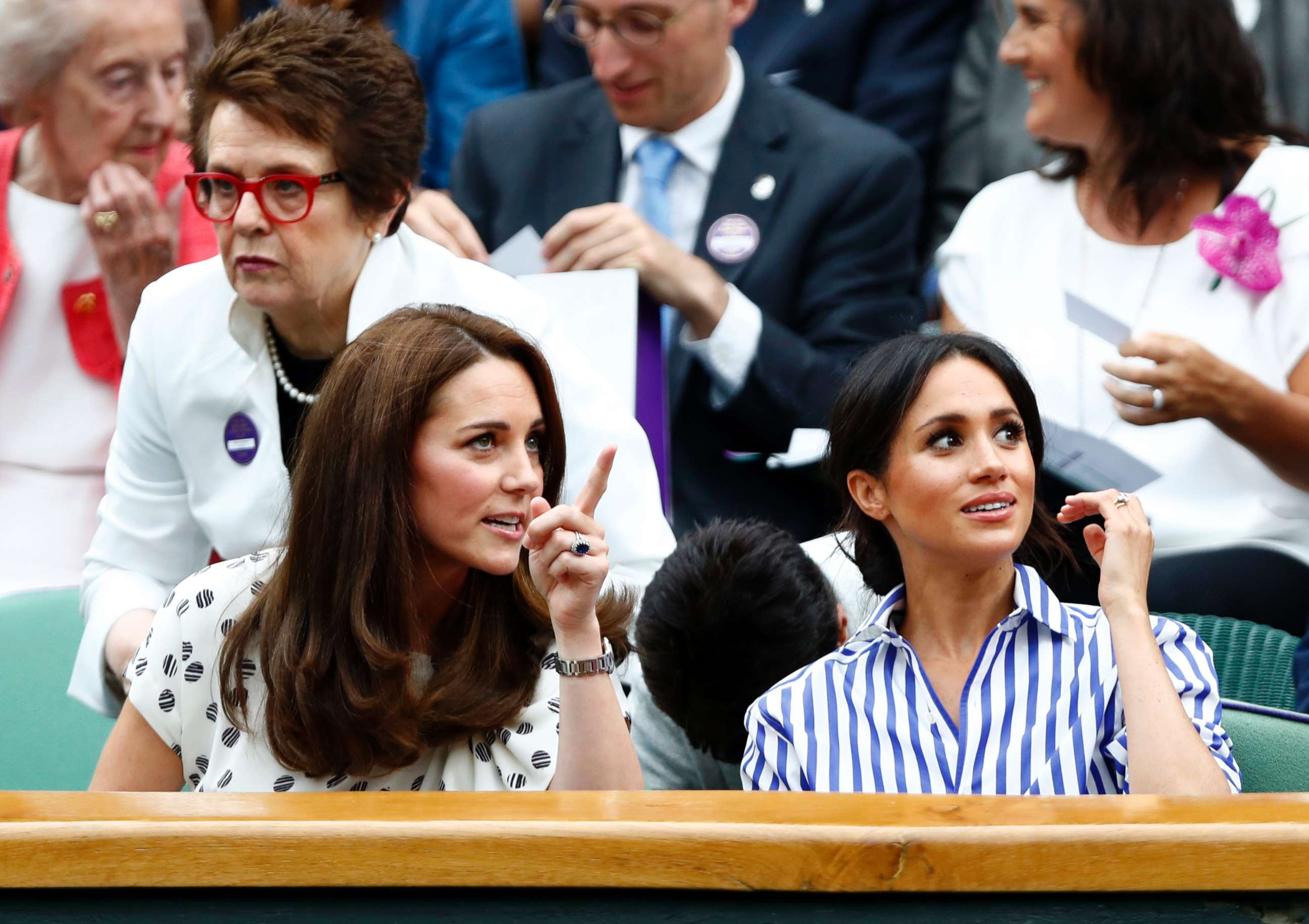 PHOTO: Catherine, Duchess of Cambridge and Meghan, Duchess of Sussex, right, sit in the Royal Box on Center Court at the Wimbledon Tennis Championships, in London, July 14, 2018.