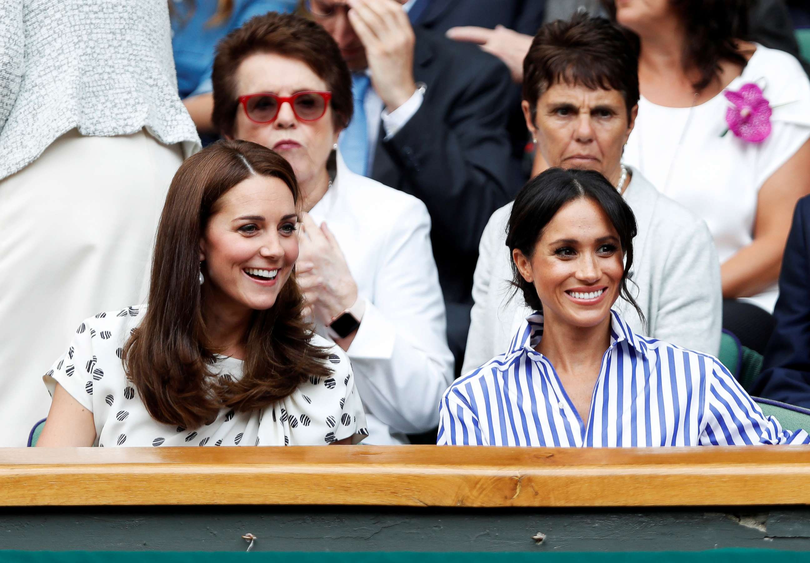PHOTO: Britain's Catherine, Duchess of Cambridge and Meghan, Duchess of Sussex watch Serena Williams of the U.S. play the women's singles final against Germany's Angelique Kerber at All England Lawn Tennis and Croquet Club in London, July 14, 2018.