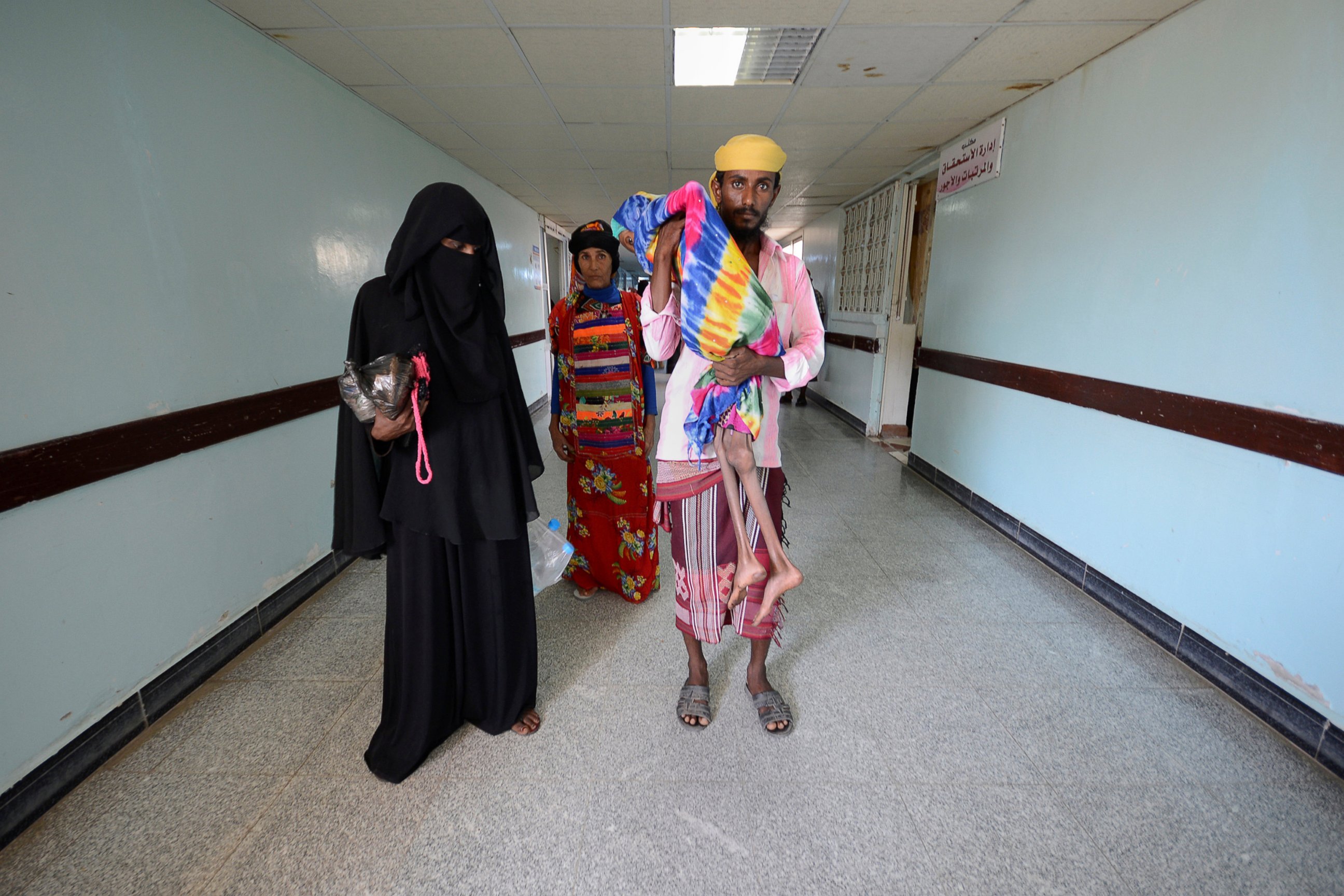 PHOTO: Saida Ahmad Baghili is carried by her cousin at the al-Thawra hospital where she is receiving treatment for severe acute malnutrition in the Red Sea port city of Houdieda, Yemen, Oct. 25, 2016. 