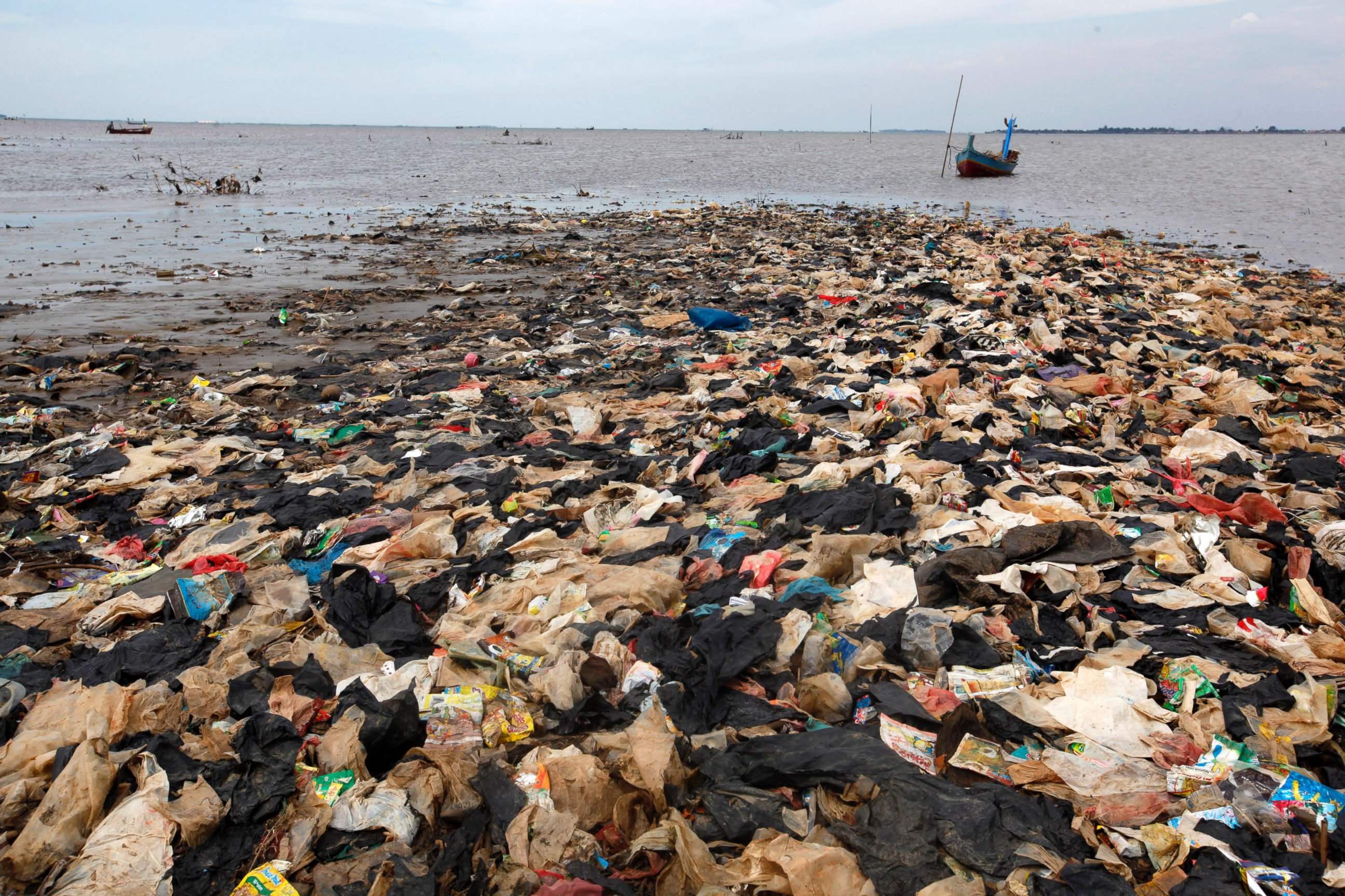 PHOTO: A small island formed by the accumulation of trash is pictured in Tanjung Burung, on the coast of Indonesia's Banten province June 5, 2013.