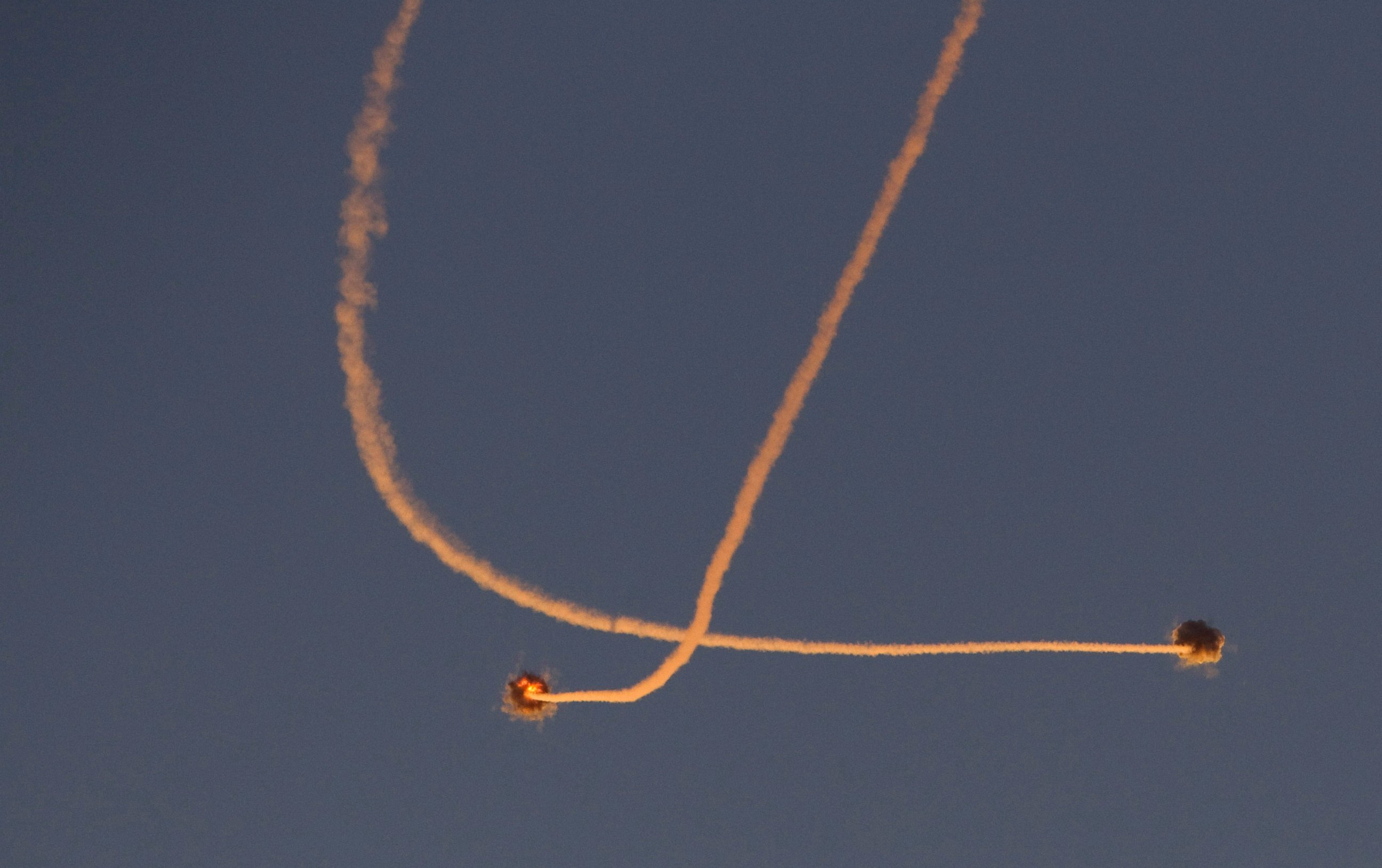 PHOTO: Smoke trails are seen as an Iron Dome intercepts a rocket which was launched from Gaza, near the southern town of Sderot November 15, 2012.