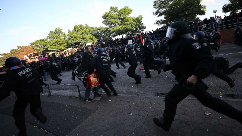 PHOTO: German riot police try to stop protesters during the demonstrations during the G-20 summit in Hamburg, Germany, July 6, 2017.