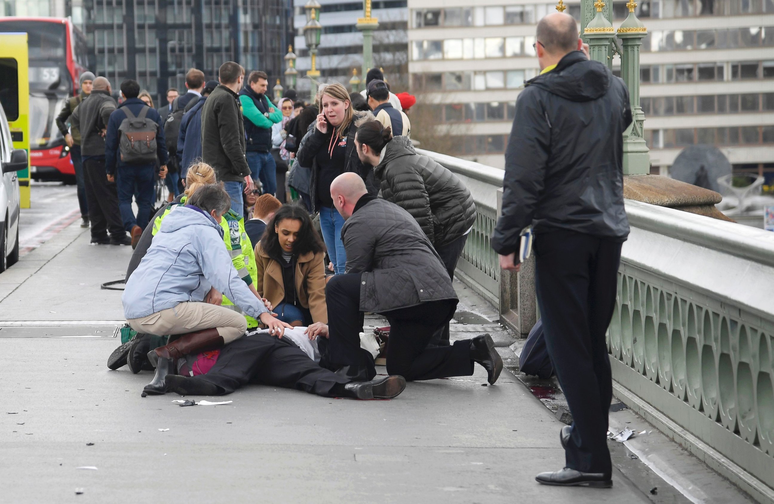 PHOTO: Injured people are assisted after an incident on Westminster Bridge in London, March 22, 2017.