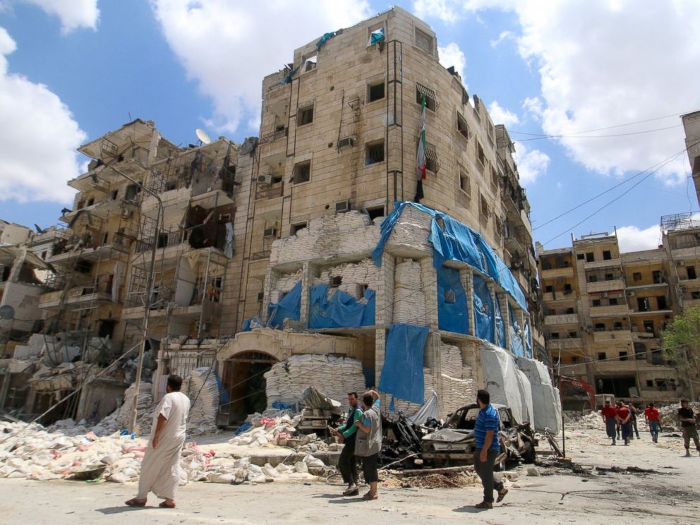 PHOTO: People inspect the damage at al-Quds hospital after it was hit by airstrikes, in a rebel-held area of Syrias Aleppo, April 28, 2016.