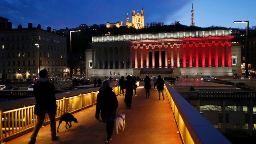 PHOTO: The colors of the Belgian flag are projected on the courthouse in Lyon, France, in tribute to the victims of today's Brussels bomb attacks, March 22, 2016.