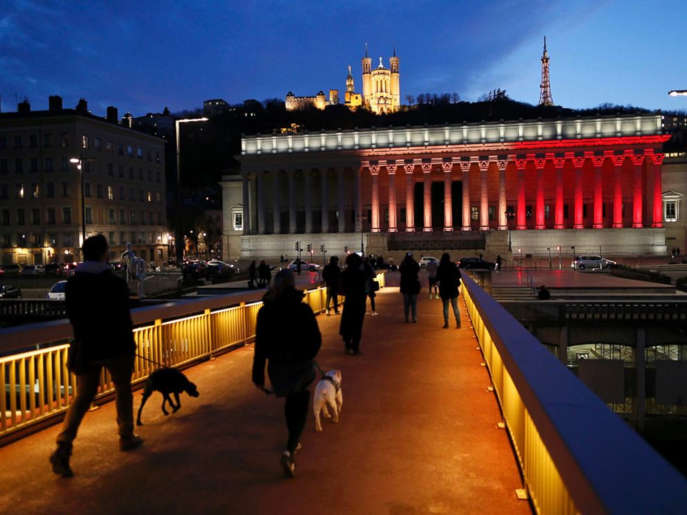 PHOTO: The colors of the Belgian flag are projected on the courthouse in Lyon, France, in tribute to the victims of todays Brussels bomb attacks, March 22, 2016.