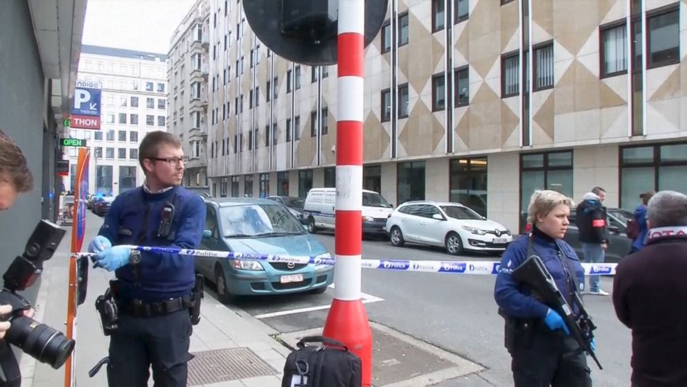 PHOTO: Emergency personnel are seen at the scene of a blast outside a metro station in Brussels, in this still image taken from video on March 22, 2016.