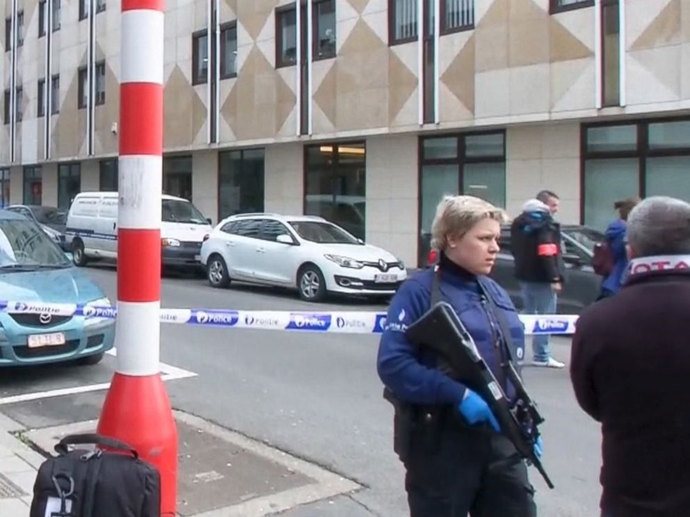 PHOTO: Emergency personnel are seen at the scene of a blast outside a metro station in Brussels, in this still image taken from video on March 22, 2016.