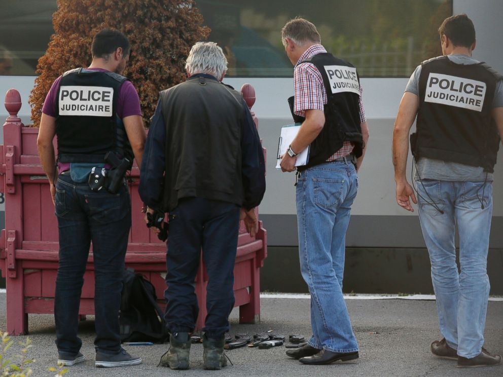 PHOTO: French judicial police stand on the train platform near gun cartridges and a backpack in Arras, France, Aug. 21, 2015.