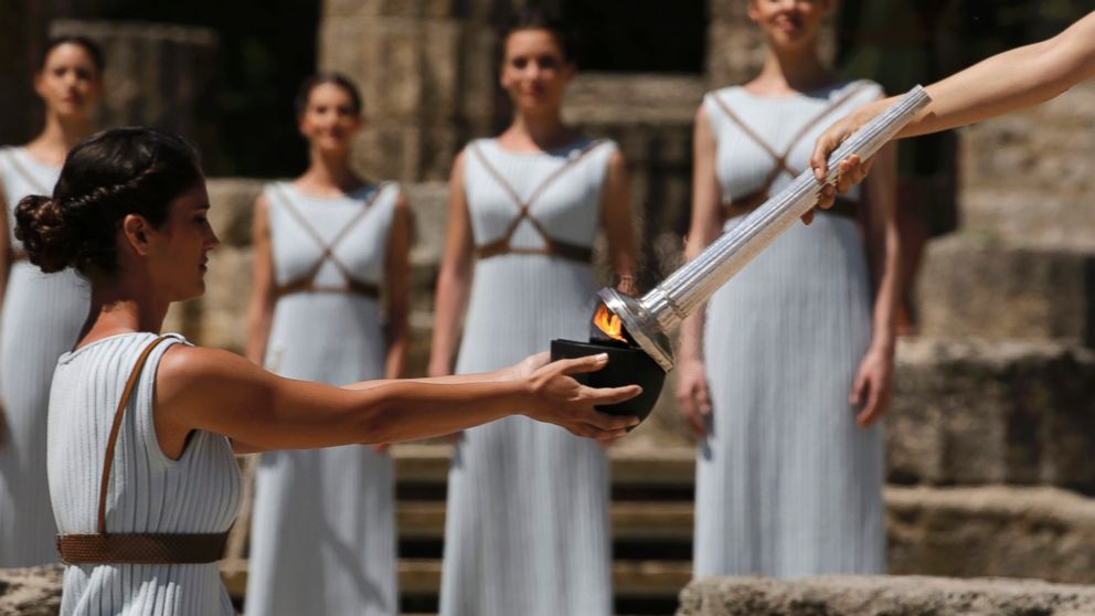 Priestesses attend the Olympic flame lighting ceremony for the Rio 2016 Olympic Games inside the ancient Olympic Stadium on the site of ancient Olympia, Greece, April 21, 2016.