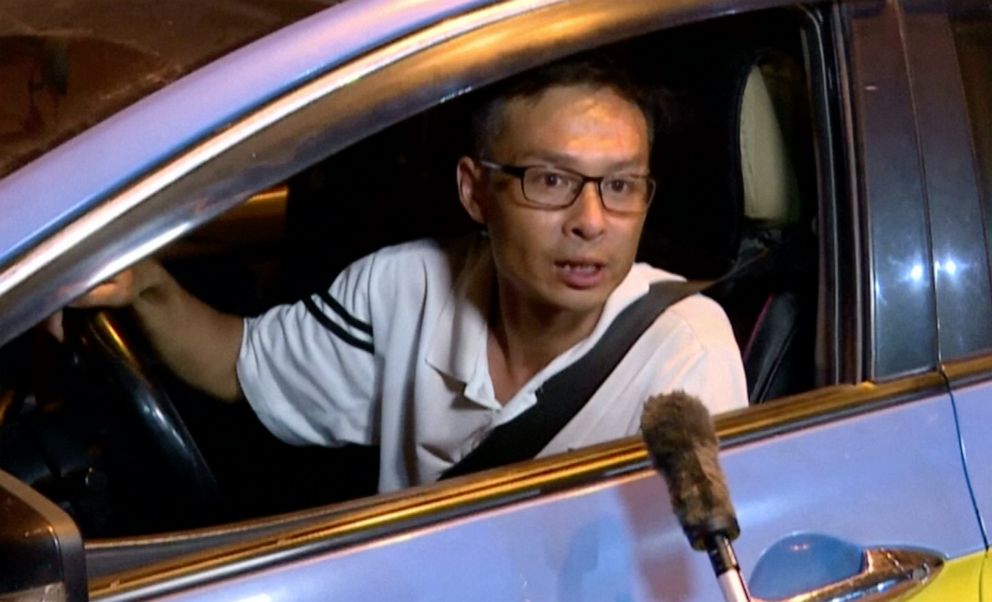PHOTO: Taxi driver Hu Wengang said he heard someone call for help before he saw a car with no driver go flying by his cab, Saturday, July 20, 2019.