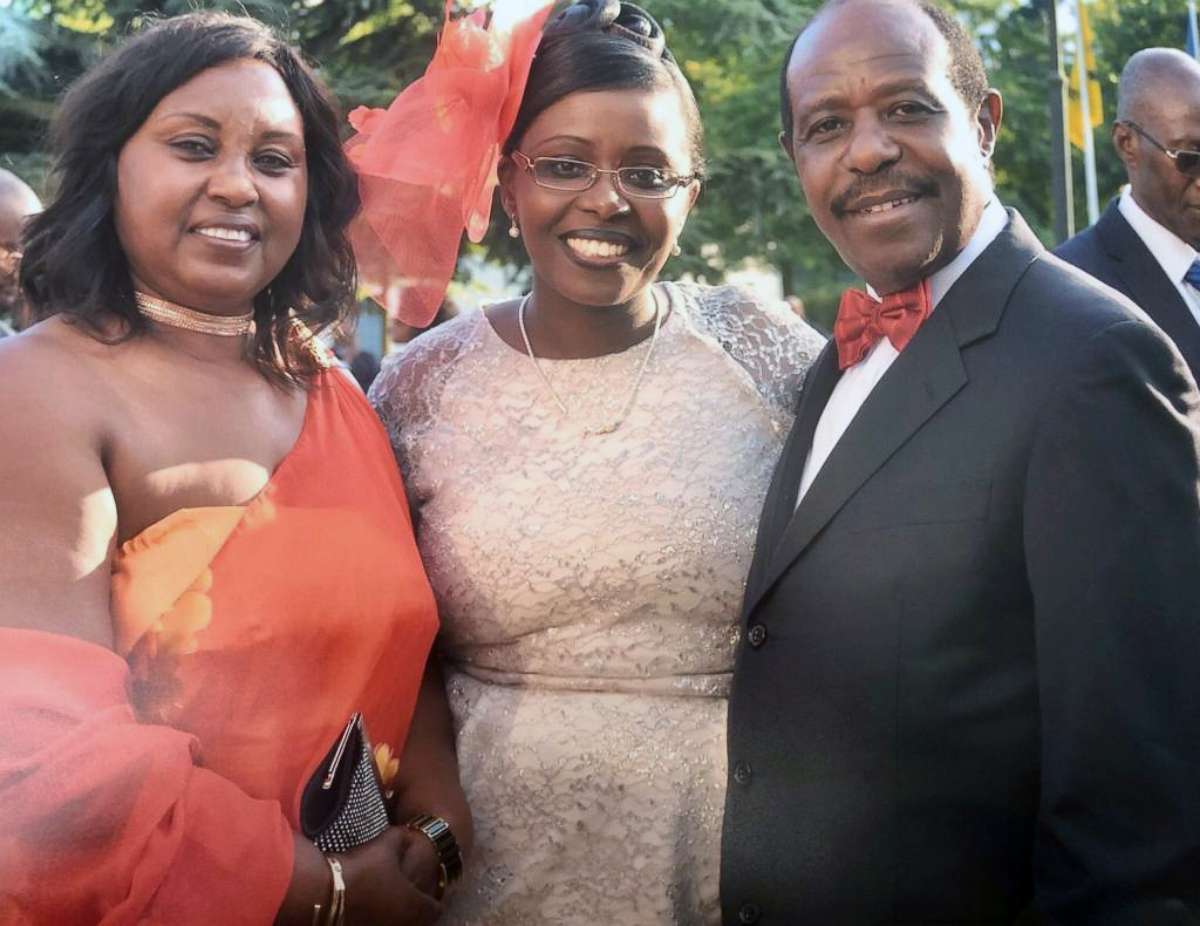 PHOTO: Paul Rusesabagina (right) is pictured with his wife, Taciana Rusesabagina (left), and their daughter, Lys Rusesabagina (center), at his 60th birthday party in Belgium in June 2014.