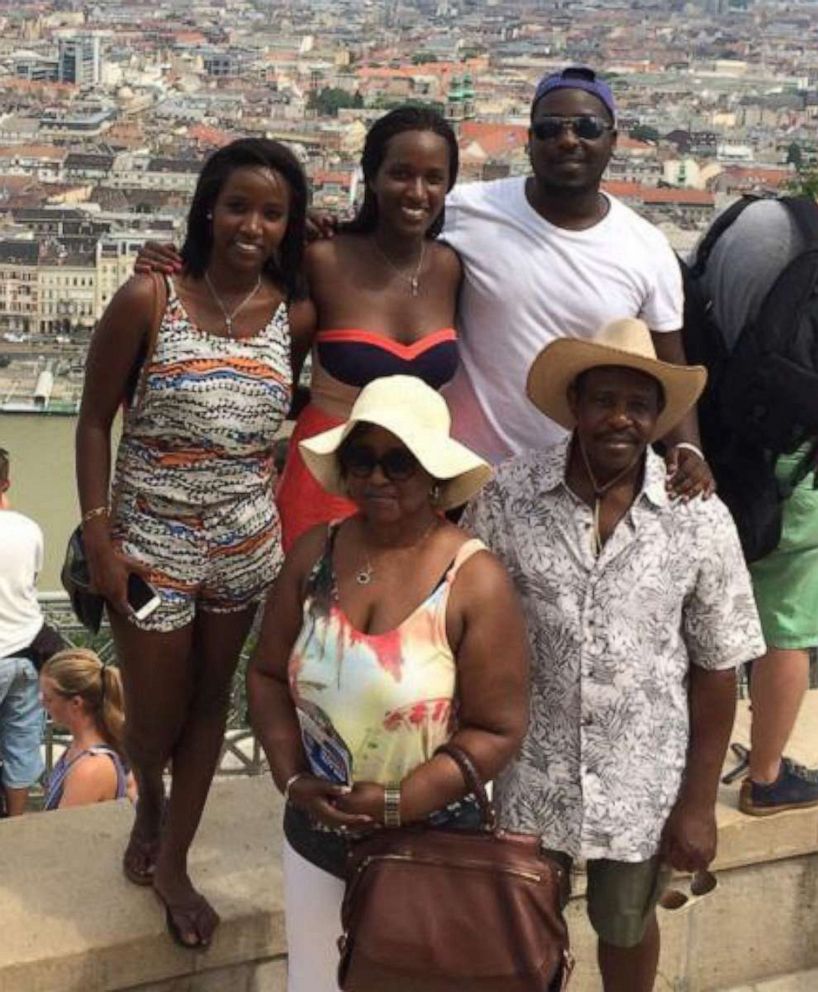 PHOTO: Paul Rusesabagina (bottom right) and his wife, Taciana Rusesabagina (bottom left), are pictured with their children, Carine Kanimba (top left), Anaise Kanimba (top center) and Tresor Rusesabagina (top right), in Budapest, Hungary, in August 2014.