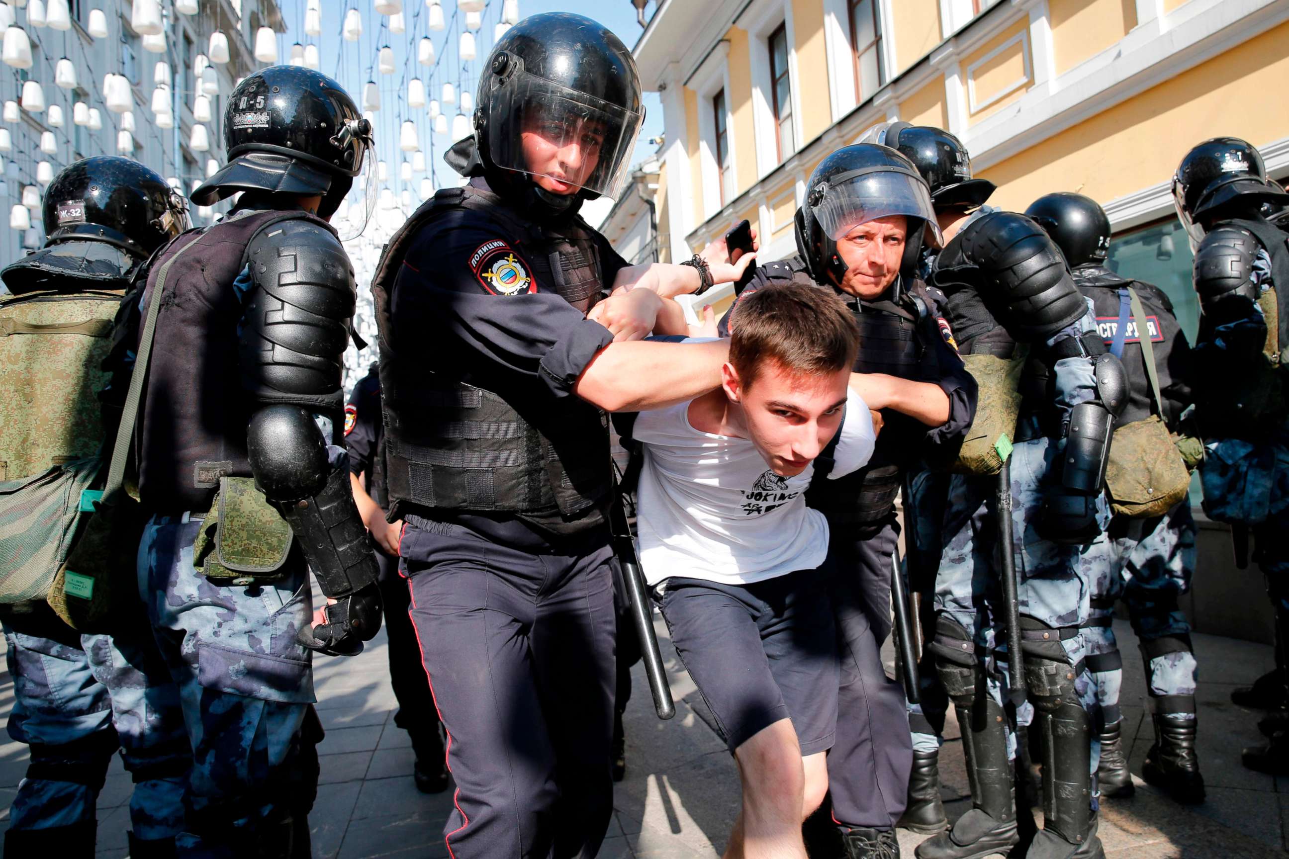 PHOTO: Police officers detain a demonstrator during an unauthorized rally demanding independent and opposition candidates be allowed to run for office in local election in September, in downtown Moscow, July 27, 2019. 