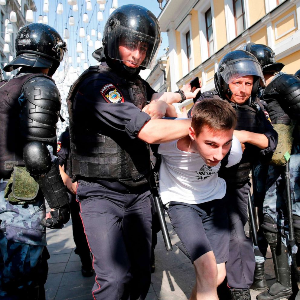 PHOTO: Police officers detain a demonstrator during an unauthorized rally demanding independent and opposition candidates be allowed to run for office in local election in September, in downtown Moscow, July 27, 2019.