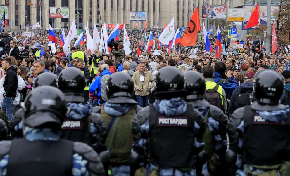 PHOTO: Law enforcement officers stand guard during a rally to demand authorities allow opposition candidates to run in the upcoming local election in Moscow, Aug. 10, 2019.