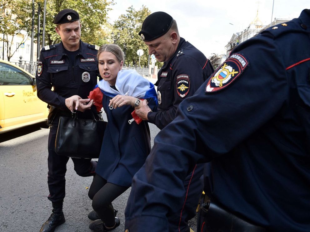 PHOTO:Police officers detain an opposition candidate and lawyer at the Foundation for Fighting Corruption Lyubov Sobol prior to an unsanctioned rally in the center of Moscow, July 27, 2019.