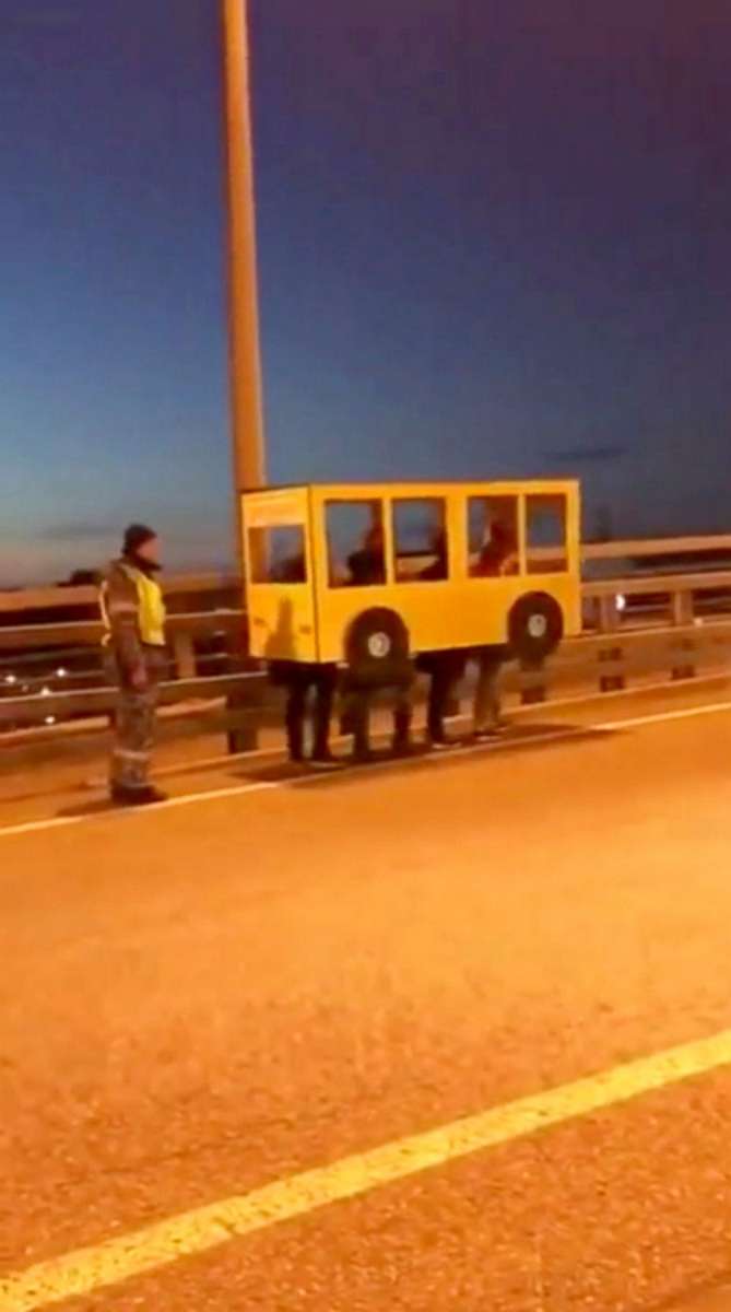 PHOTO: A video shared widely on Russian social media on Nov. 13, 2018, showed four people dressed as a bus walking on the Golden Bridge in Vladivostok, Russia.