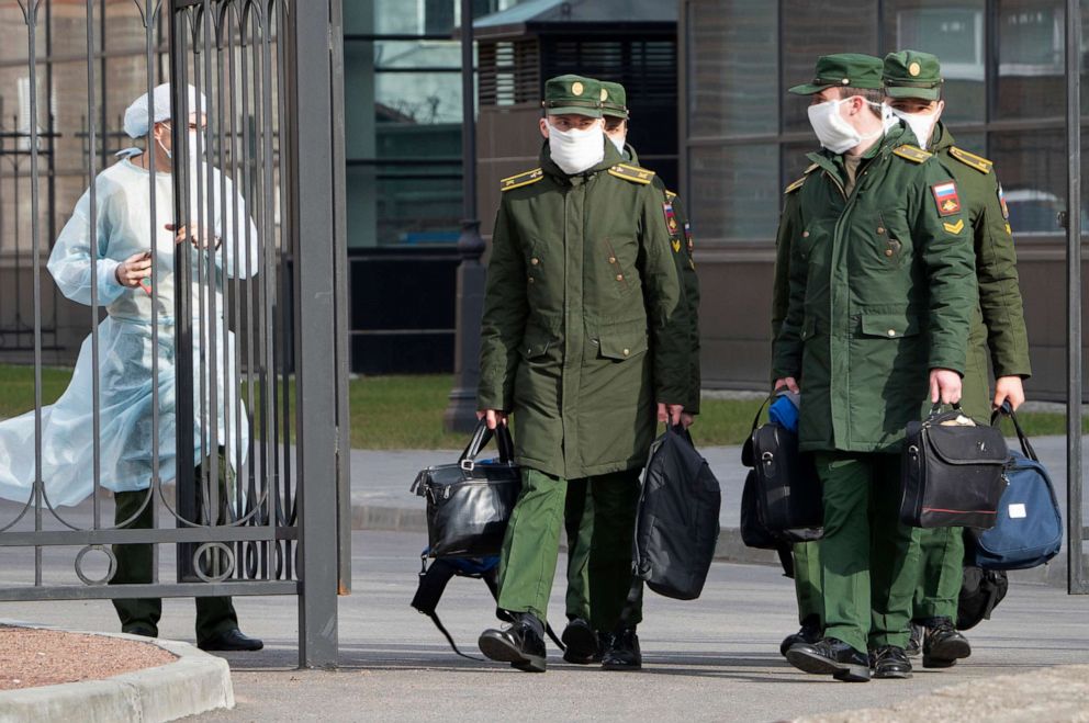 PHOTO: Cadets of S. M. Kirov Military Medical Academy exit the gate of the academy dormitory in St. Petersburg, Russia, on April 21, 2020.